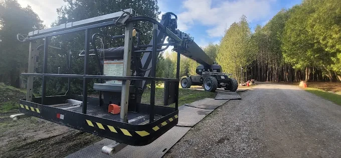 Large crane operating on Call Time Rentals Trak Mat temporary access route